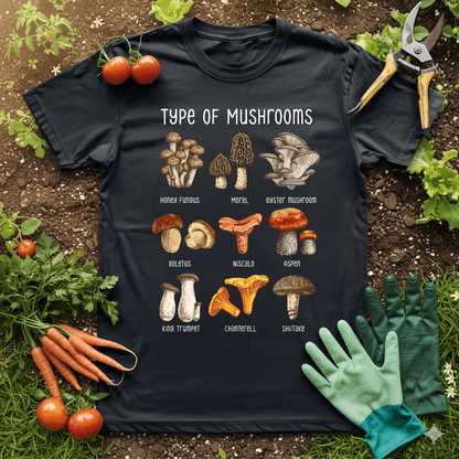 Mushroom name t-shirt featuring various types of mushrooms illustrated on a black tee with gardening tools and fresh produce.