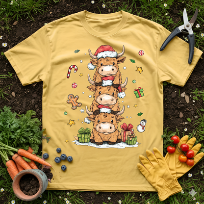 Cute Highland Cow Christmas T-Shirt featuring stacked cows in Santa hats with gifts and candy canes.